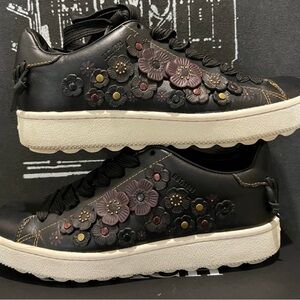 Coach Black tea rose floral Sneakers 
size 7.5 
Pre-Owned great condition.